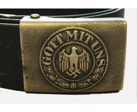 A SECOND WORLD WAR GERMAN ARMY BELT BUCKLE. A German Wermacht Heer enlisted man's belt buckle with the motto Gott Mituns (God