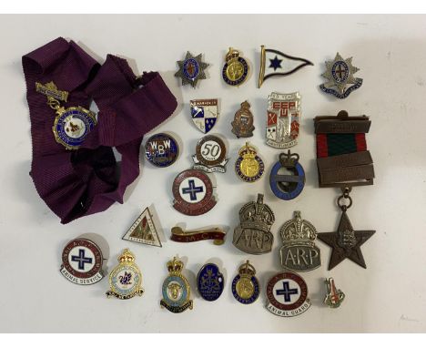 TWO SILVER ARP BADGES AND A COLLECTION OF ENAMEL BADGES. Two ARP badges hallmarked for London 1936 and 37, enamel badges to i