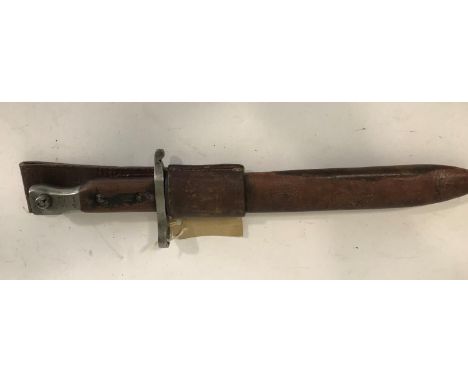 A FIRST WORLD WAR CANADIAN MKII ROSS BAYONET. A bayonet with a single edged 25cm blade, with wooden mounted grip, stamped 'Ro