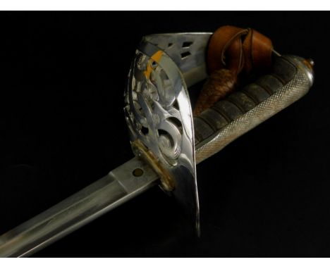 An early 20thC rifle volunteer's officer's sword, with shagreen handle and leather scabbard and canvas outer case (M)