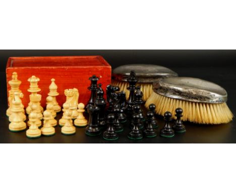 Two silver handled brushes and a chess set, the brushes marked Hermann, Sheffield 1903 & 1904, with wooden chess set, in red 