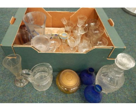 An early 20thC glass etc., to include amber tinted powder bowl with cut decoration, a Bohemian type ruby flash bottle and cov