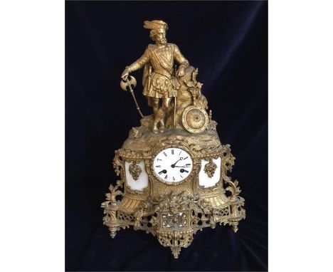 An interesting Mantle clock with Highlander situated on the top.