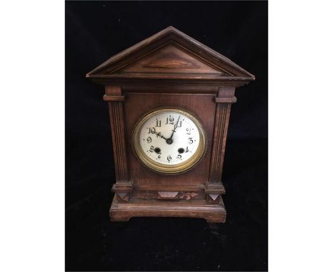 An Oak clock, tabernacle style