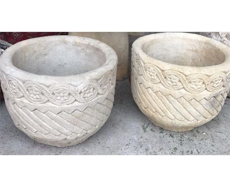 A pair of garden stoneware Mayan pots