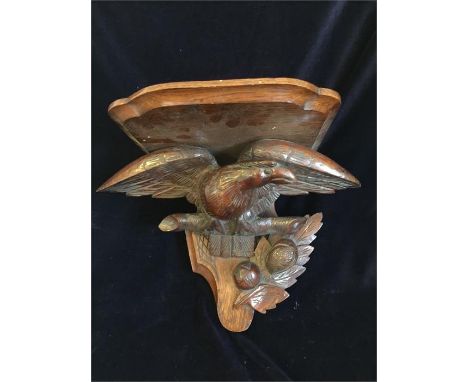 A Carved Eagle Shelf