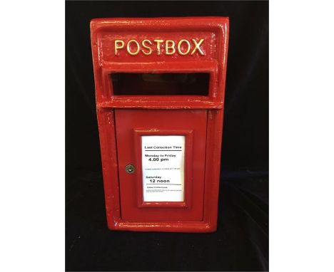 A Cast Iron Wall Mounted Post Box