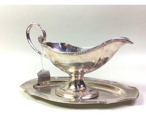 WMF SILVER PLATED SAUCE BOAT, affixed to shaped stand, stamped marks26cm wide