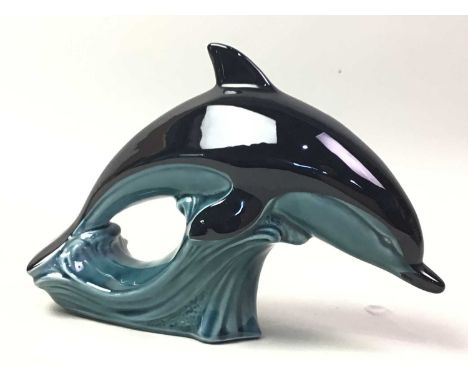 SET OF EIGHT POOLE POTTERY DOLPHINS, in black and pale blue23cm and 17cm long Qty: 8