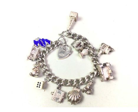 SILVER CHARM BRACELET, ALONG WITH OTHER JEWELLERY  the bracelet with various charms including map of Scotland, bear, building