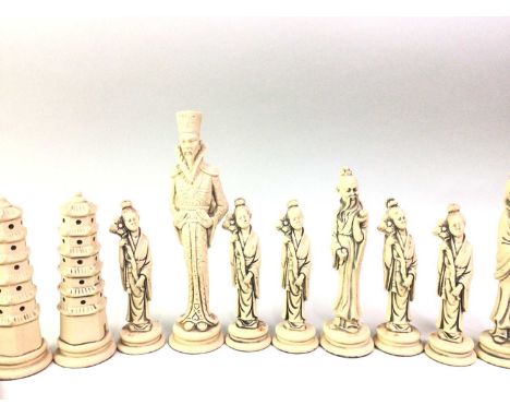 CHINESE STYLE CHESS SET, AND A PAIR OF SILVER JAM SPOONS  the pieces modelled in the form of male and female figures and pavi