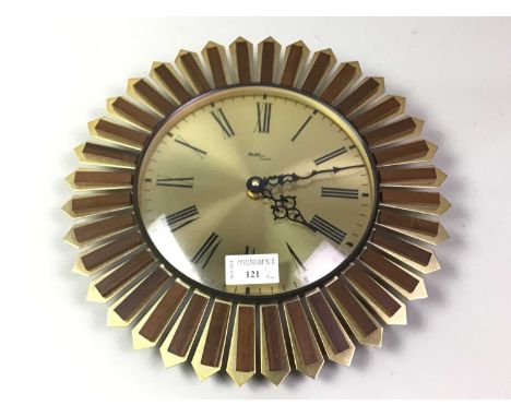 AVIA MID CENTURY SUNBURST WALL CLOCK, AND A SWIZA ALARM CLOCK the wall clock made in Japan31cm diameterQty: 2