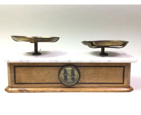 SET OF COUNTER TOP BALANCE SCALES, EARLY / MID 20TH CENTURY with marble top and removable brass pans36cm wide