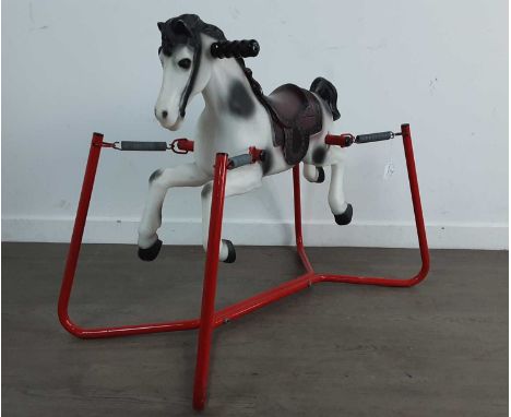 VINTAGE ROCKING HORSE, MID / LATE 20TH CENTURY with leather effect saddle, on a metal sprung frame71cm wide