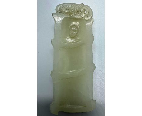 CHINESE JADE AMULET, LATE 19TH /  EARLY 20TH CENTURY carved in the form of a bamboo branch, with a Phoenix finial and a scara