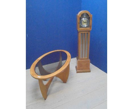 Contemporary walnut cased grandmother clock and a contemporary design glass top table 107cm w Made by current vendors uncle, 