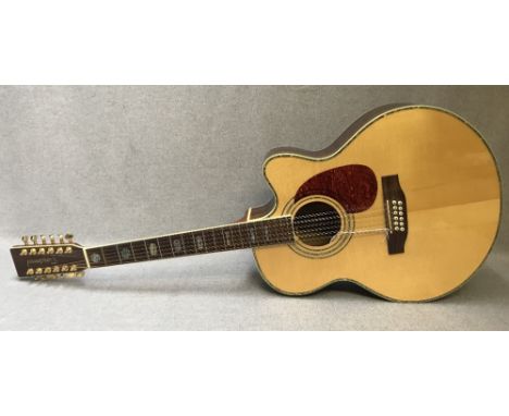 Cased Tanglewood 12 string guitar 