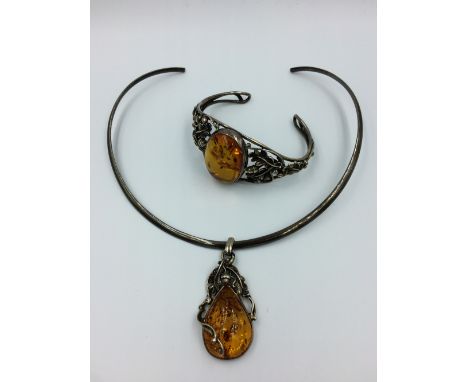 White metal amber torque pendant with matching bangle bracelet 