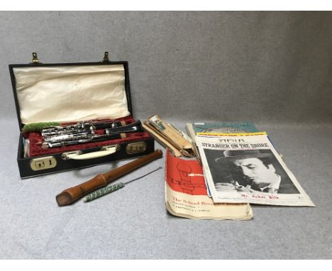 Boosey and Hawkes cased clarinet descant recorder, record & sheet music 