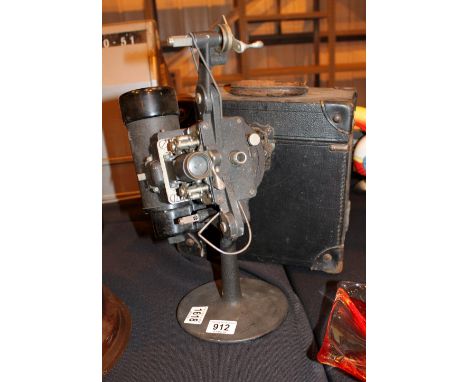 Antique Bell & Howell of Chicago Filmo automatic cine projector with case and screen