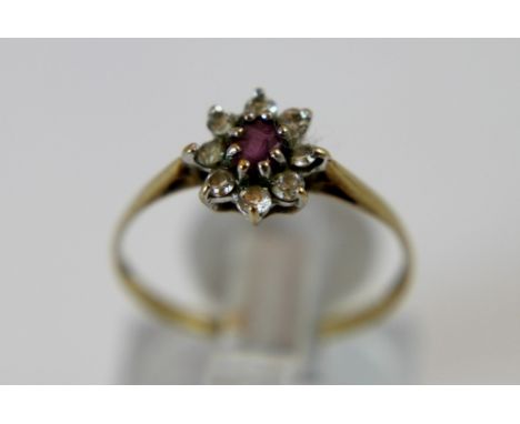 9 ct gold ladies ruby cluster ring, size M