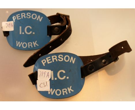 Pair of Person I C work metal and enamel arm badges