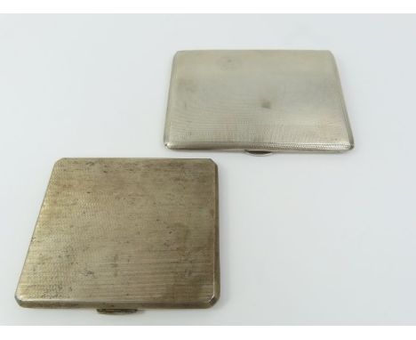 Two silver cigarette cases, both with engine turned decoration and inscriptions to the interior, 312.8g gross (10.06 Troy oun