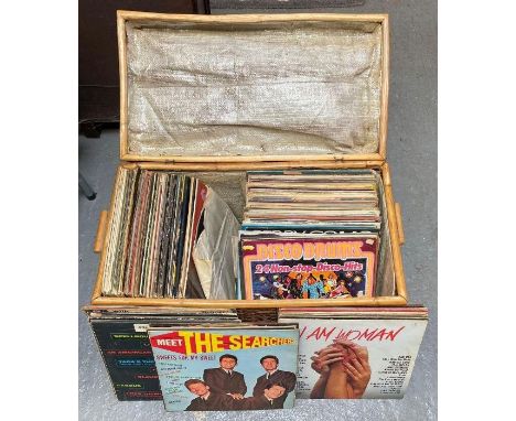 A collection of records including The Beatles, The Rolling Stones, Queen and various others 