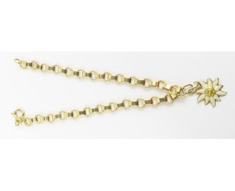 A fancy link bracelet with enamel flower charm attached, marked '585', 18cm long5.6g gross