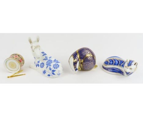 Royal Crown Derby paperweights - drum with drum sticks, no stopper, boxed; a badger, no stopper; a fox decorated in blues, no
