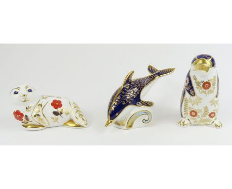 Royal Crown Derby paperweights - a seal decorated with orange flowers, silver stopper; a platypus decorated with orange and l