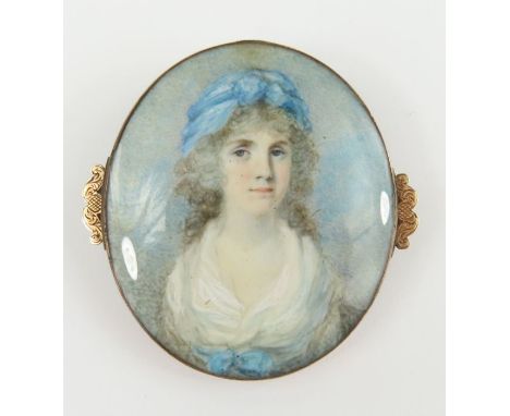 A portrait miniature of a lady, purportedly Mrs Cobb of Cobb Hall, now known as Snettisham House; in a simple brooch mount, t