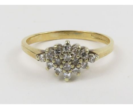 A 9ct gold diamond cluster ring, finger size L 1/2, 1.7g gross
