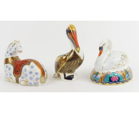 Royal Crown Derby paperweights - a swan, red printed marks to the base, silver stopper; Brown Pelican, 1998, silver stopper; 