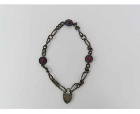 A figaro link chain, set with three enamel and glass target design discs, with heart padlock, 32cm long, the heart padlock ma