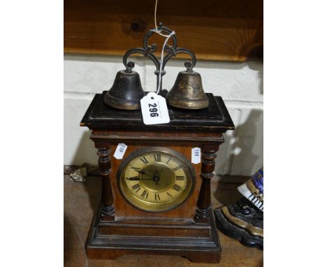     An Edwardian Walnut Encased Mantel Clock With Circular Dial                     