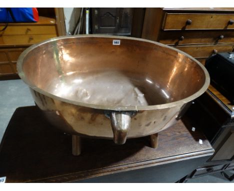     A Victorian Period Copper Sink Basin With Later Feet                            