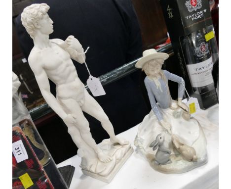 Classical style nude statue and porcelain girl feeding rabbits