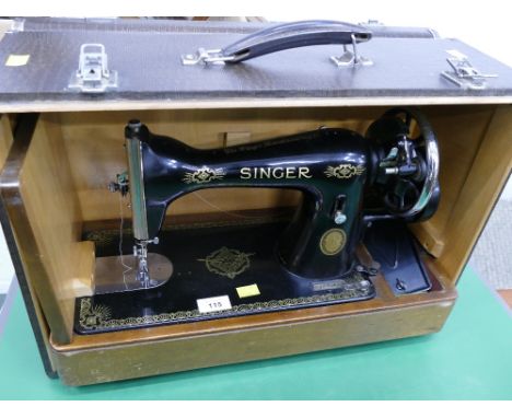 Singer hand operated sewing machine in leather effect case