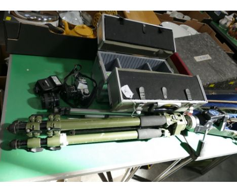 Metal case with Canon AE1 camera, lenses and accessories, Manfrotto tripod and another smaller tripod