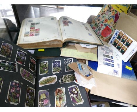 Quantity of stamp albums with contents, cigarette cards, loose stamps and other ephemera