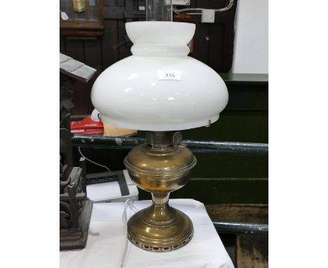 Aladdin lamp with white glass shade, converted to electricity