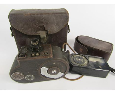 A Bell & Howell Filmo double eight companion cine camera, cased, together with a Weston cine exposure meter, cased.