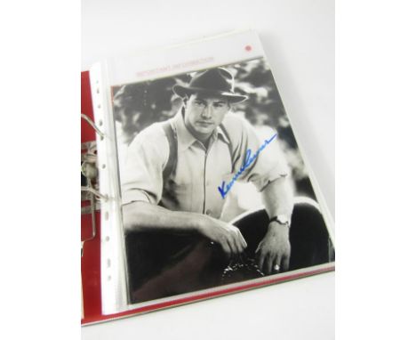 An album of autographed photographs of film, sports and pop stars, including Robbie Williams, Barbra Streisand, Eminem, Maril