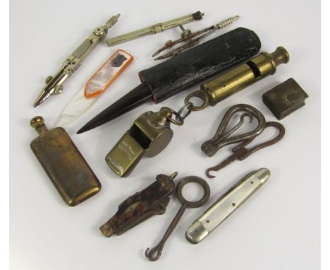 A mother of pearl page marker engraved William Freeman, Sheffield, Metropolitan and Acme Thunderer whistles, folding button h