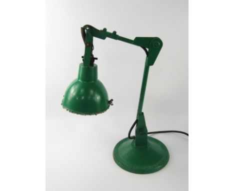A green painted cast iron anglepoise lamp, the F.E.W. Handy-Lamp by Autax, Langham, Essex, 86cm high.
