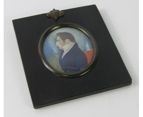 An early 19thC miniature portrait, side profile of a gentleman, verso named as Robinson,dated 1823, 6.5cm x 5cm.