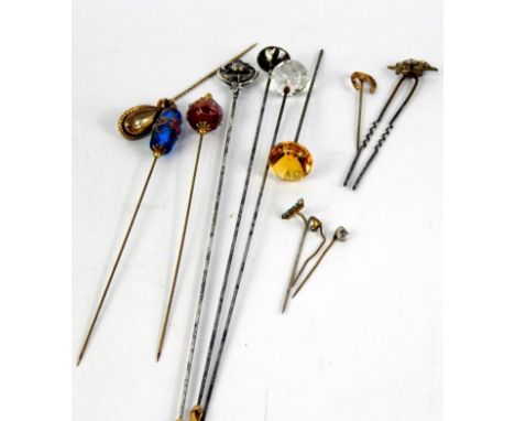 Victorian and later paste and glass set hat and stick pins, including a horseshoe pin, yellow metal and pear shaped yellow st