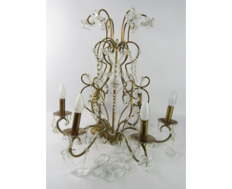 A gilt metal and cut glass six branch chandelier, 62cm high.