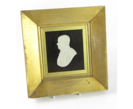 An early 19thC wax cameo portrait of a theological gentleman, 11.5cm x 11cm.
